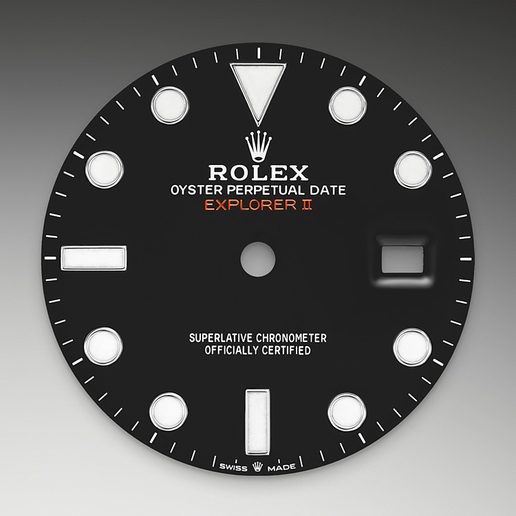  Explorer  M226570-0002 -  The Explorer II features a date display, an additional orange 24-hour hand and a fixed bezel with 24-hour graduations, enabling day to be distinguished from night. It became the watch of choice for speleologists, volcanologists and polar explorers. Its hour markers and hands feature a highly-legible Chromalight display with long-lasting blue luminescence. | L'Angolo delle Ore